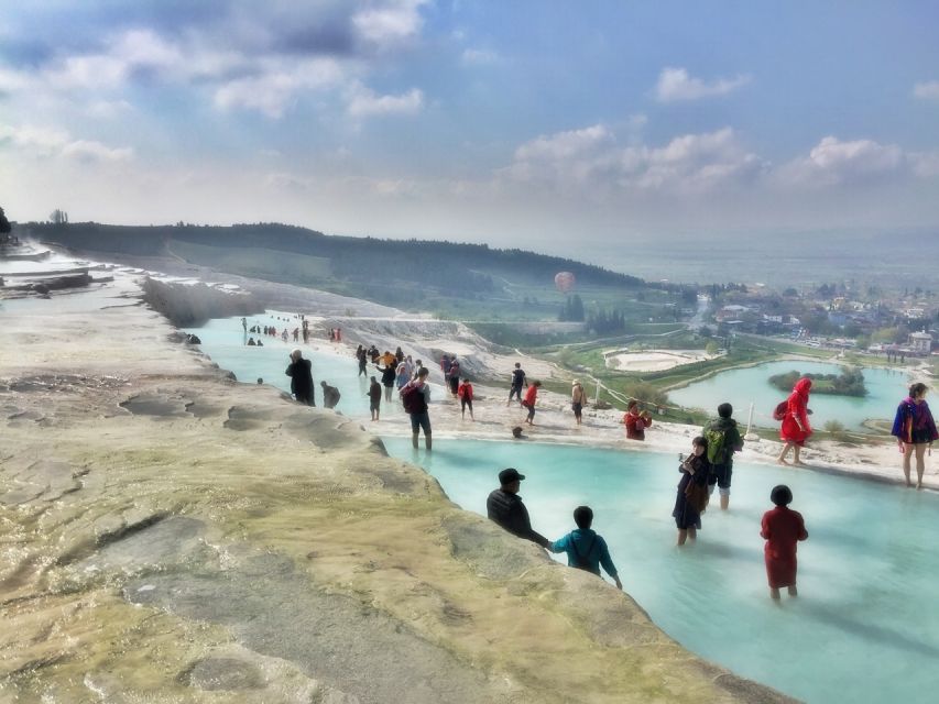 From Kusadasi and Selcuk: Pamukkale and Hiearapolis Tour - Pamukkale’s white terraces and warm water